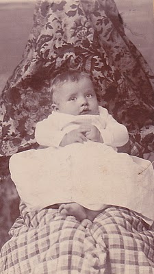 Another spooky photograph: the "hidden"mother in plain view, holding her child still. Granville Hampton, and presumably his mother, Kate Cox Hampton 